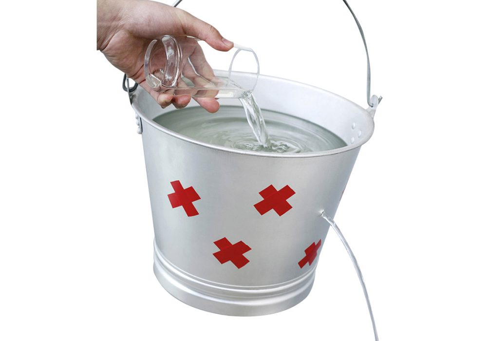 Hand pouring water from a glass into a leaking pail